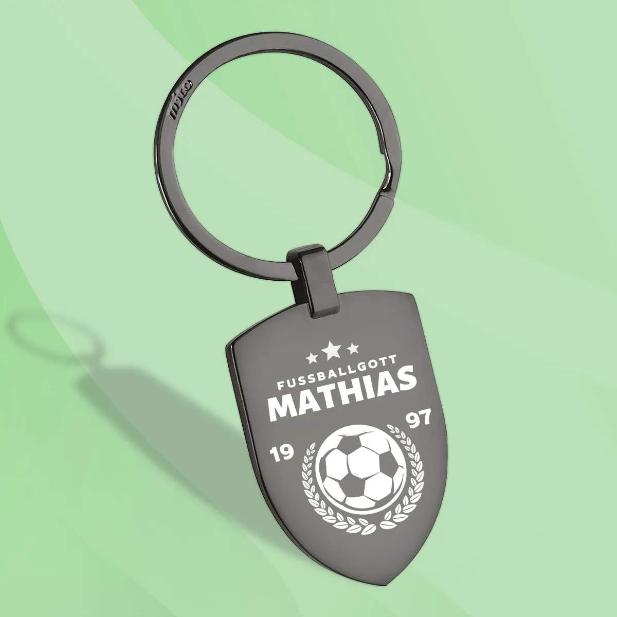 Schlüsselanhänger mit Fußballlogo und Namen personalisiert